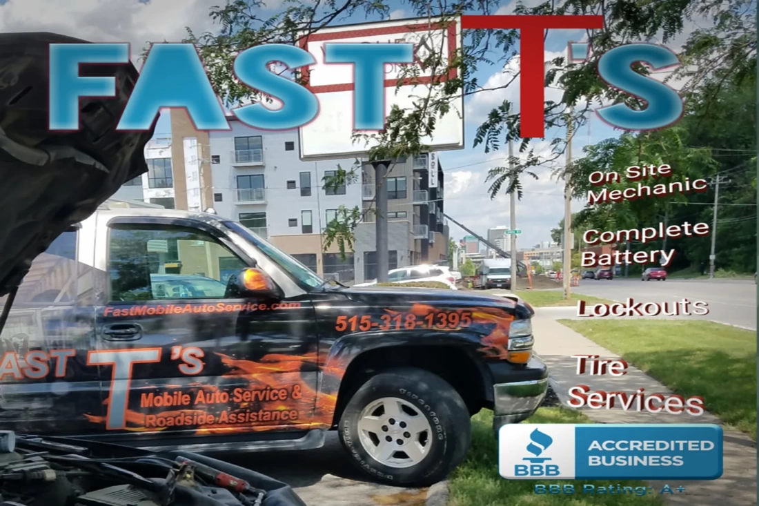 Fast T's performing a fuel line replacement in a parking place with our auto services listed in white lettering-On Site Mechanic-Complete Battery-Lockouts>>[West Des Moines-Auto Repairs]